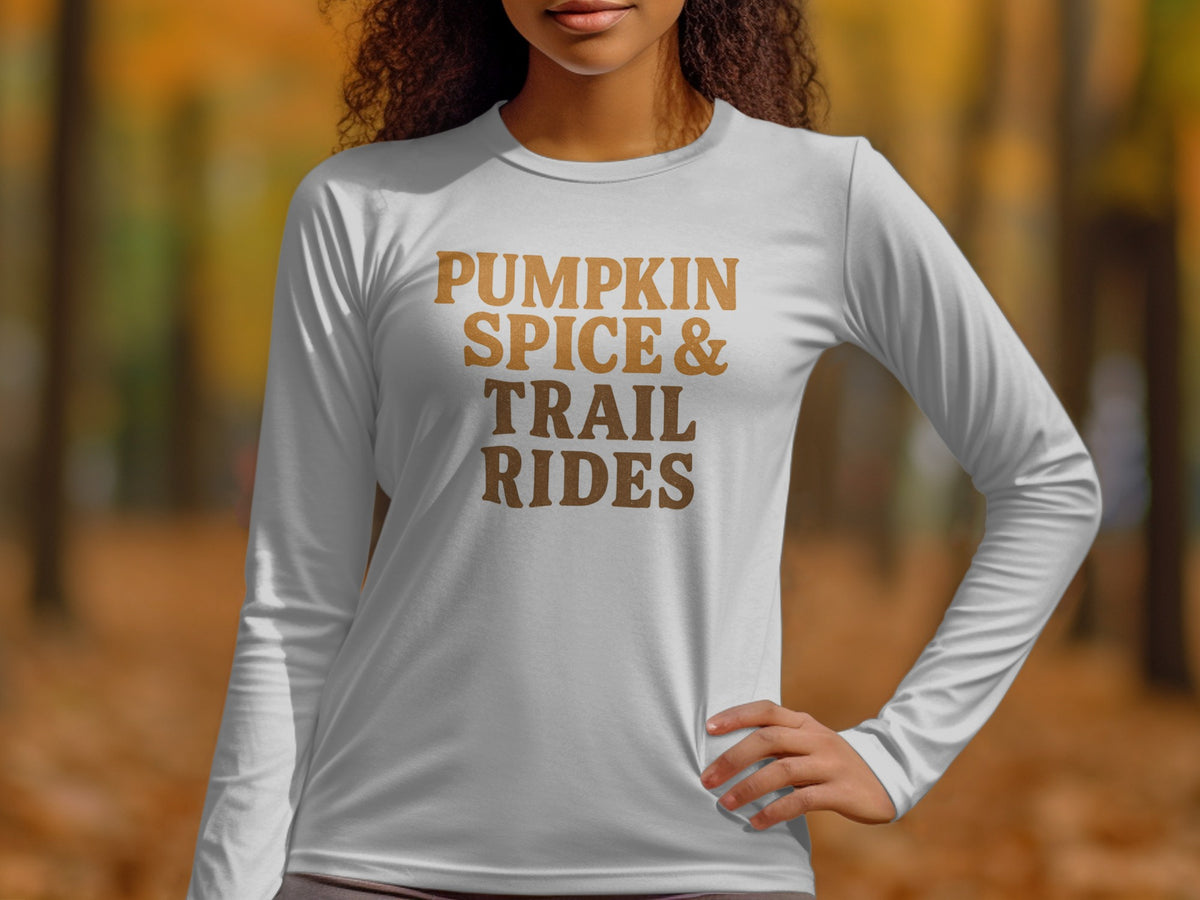White long-sleeve shirt with "PUMPKIN SPICE & TRAIL RIDES" text.