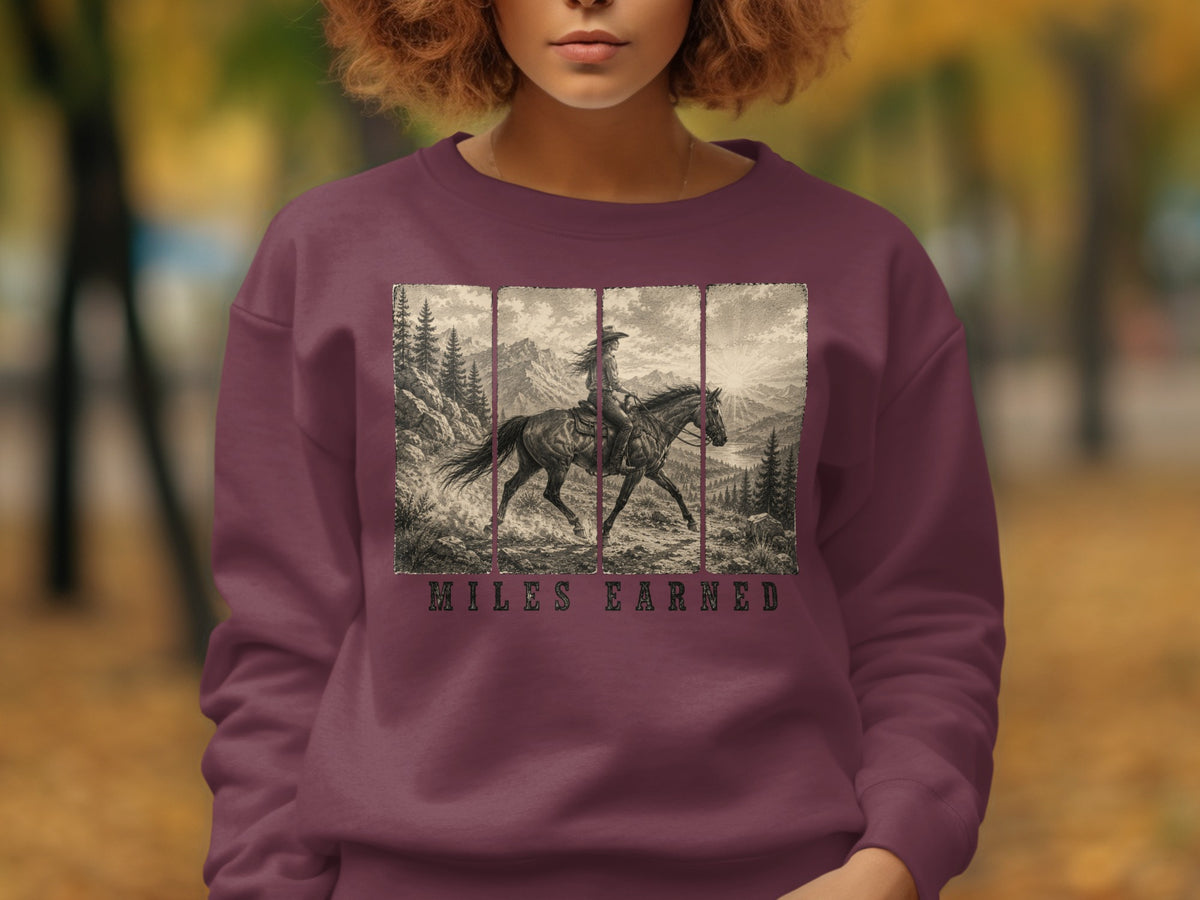 Crewneck sweatshirt with a vintage black and white graphic of a rider on a horse.