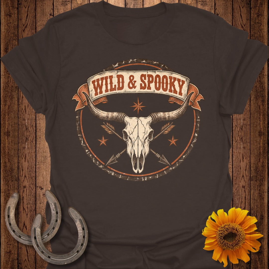 T-shirt with a bull skull, arrows, and banner text "WILD & SPOOKY".