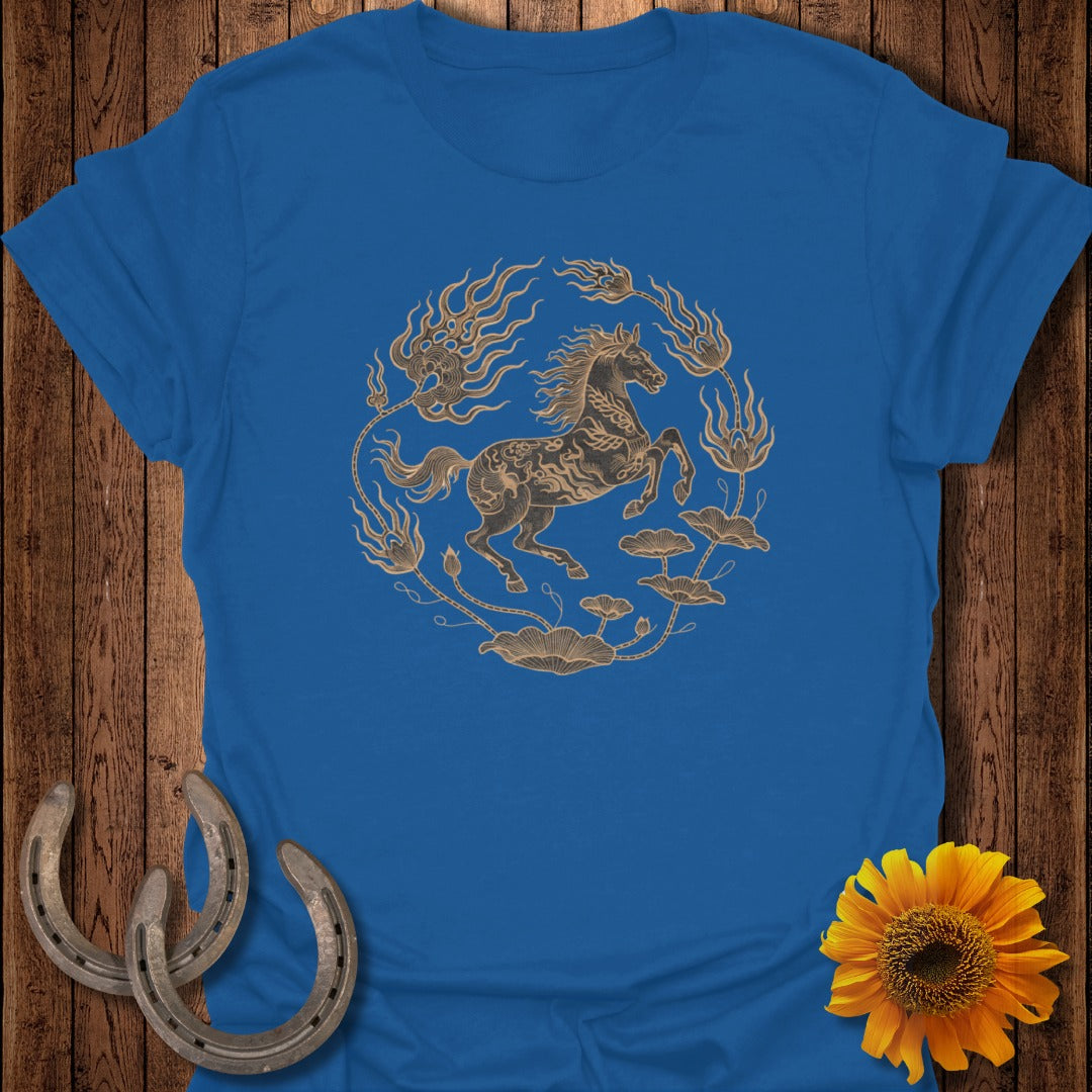 Blue t-shirt with a golden horse surrounded by floral and flame design.