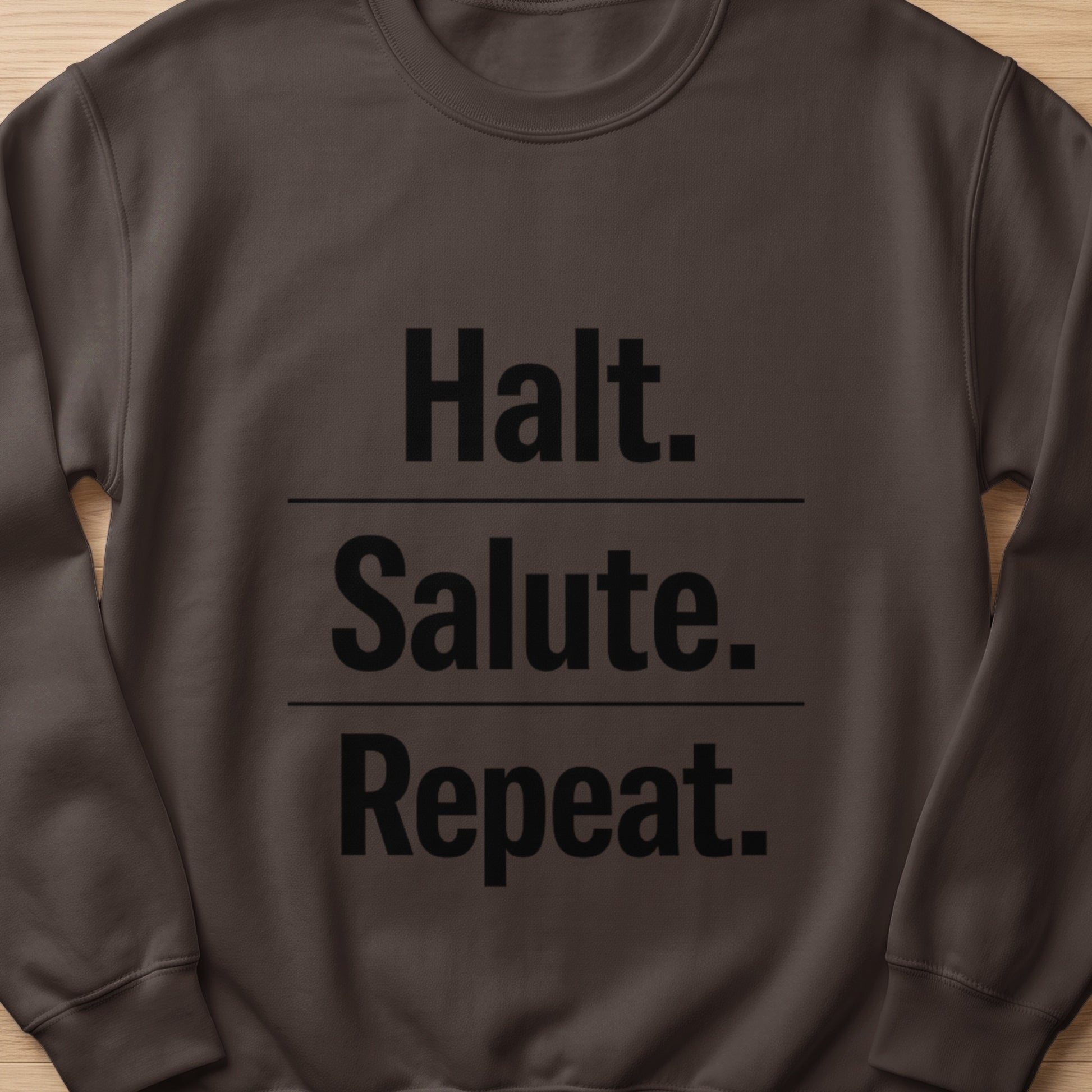 Brown sweatshirt with black text "Halt. Salute. Repeat."