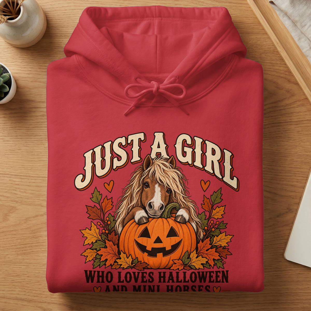 Red hoodie with "Just a Girl Who Loves Halloween and Mini Horses" text and horse illustration.