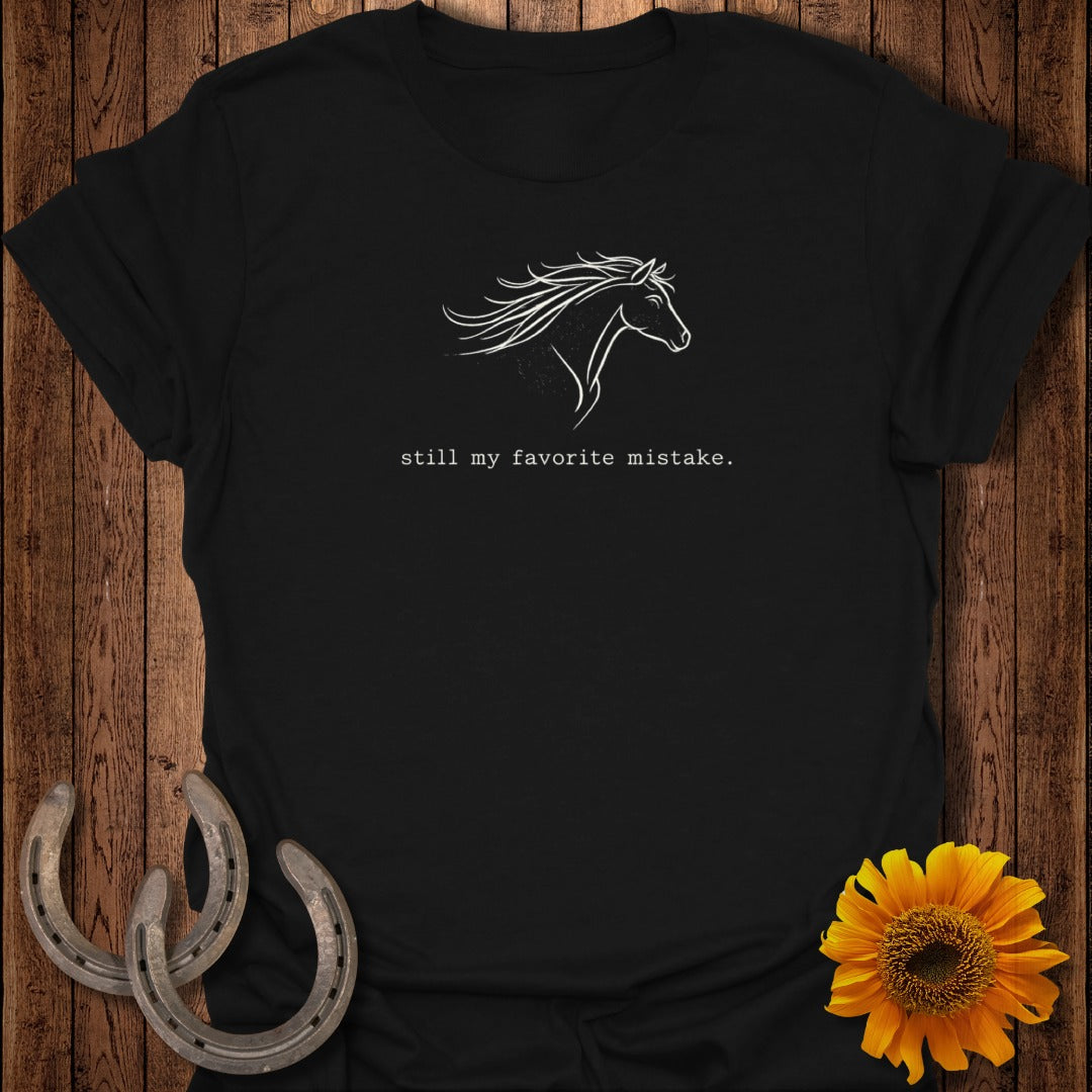 Black t-shirt with white horse outline and text "still my favorite mistake."