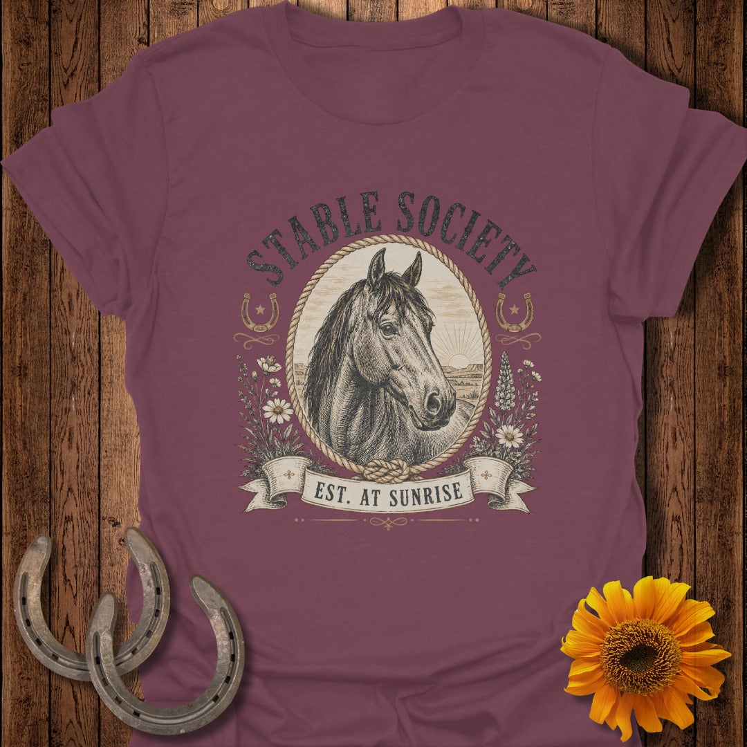 Maroon t-shirt with a horse head graphic, "Stable Society," and "Est. At Sunrise."