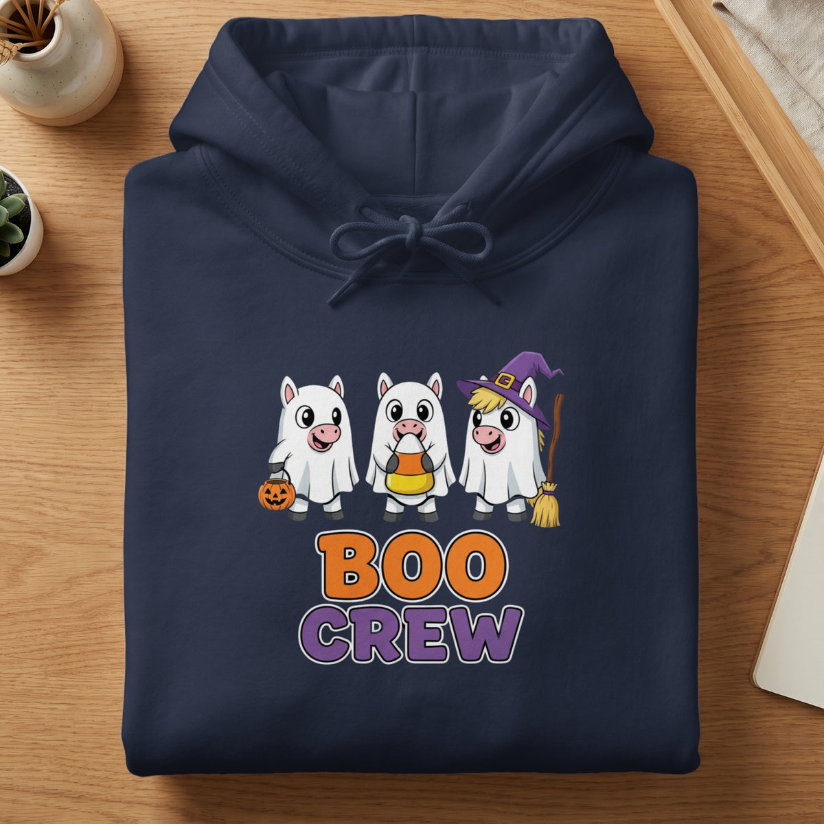 Navy hoodie with cartoon ghosts and the text "BOO CREW"