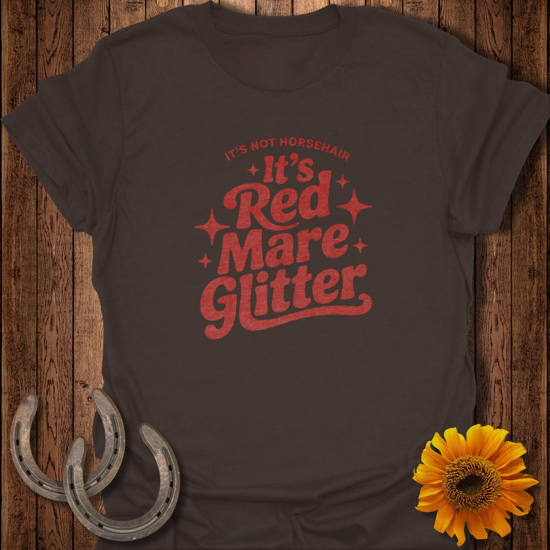 Brown t-shirt with red text "It's Not Horsehair, It's Mare Glitter".