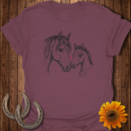 Line drawing of two horses, a mare and foal, with a sunflower and horseshoes.