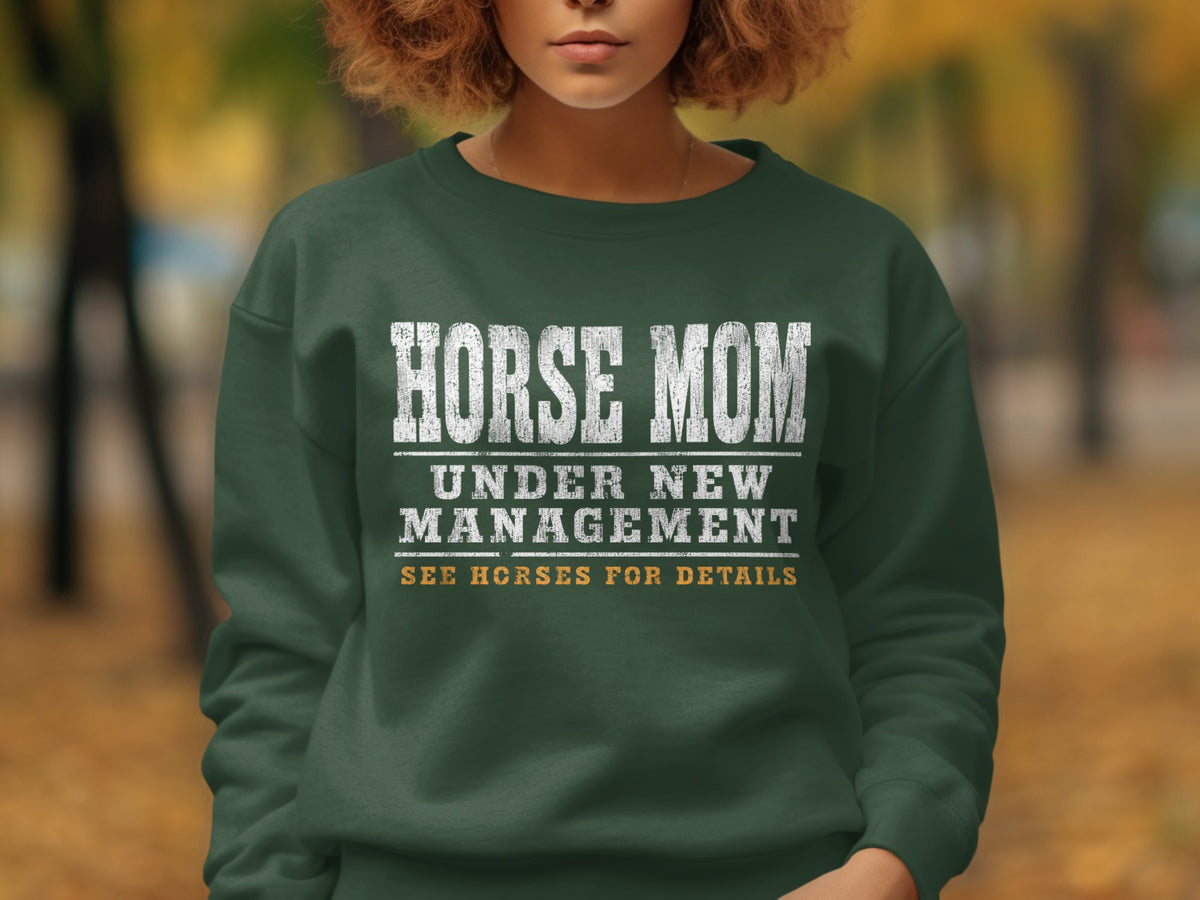 Green sweatshirt with "Horse Mom Under New Management See Horses For Details" text.