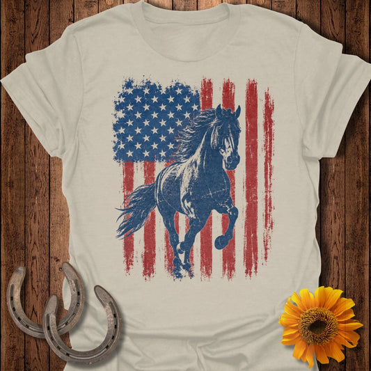 Distressed American flag with a galloping horse on a light beige t-shirt.