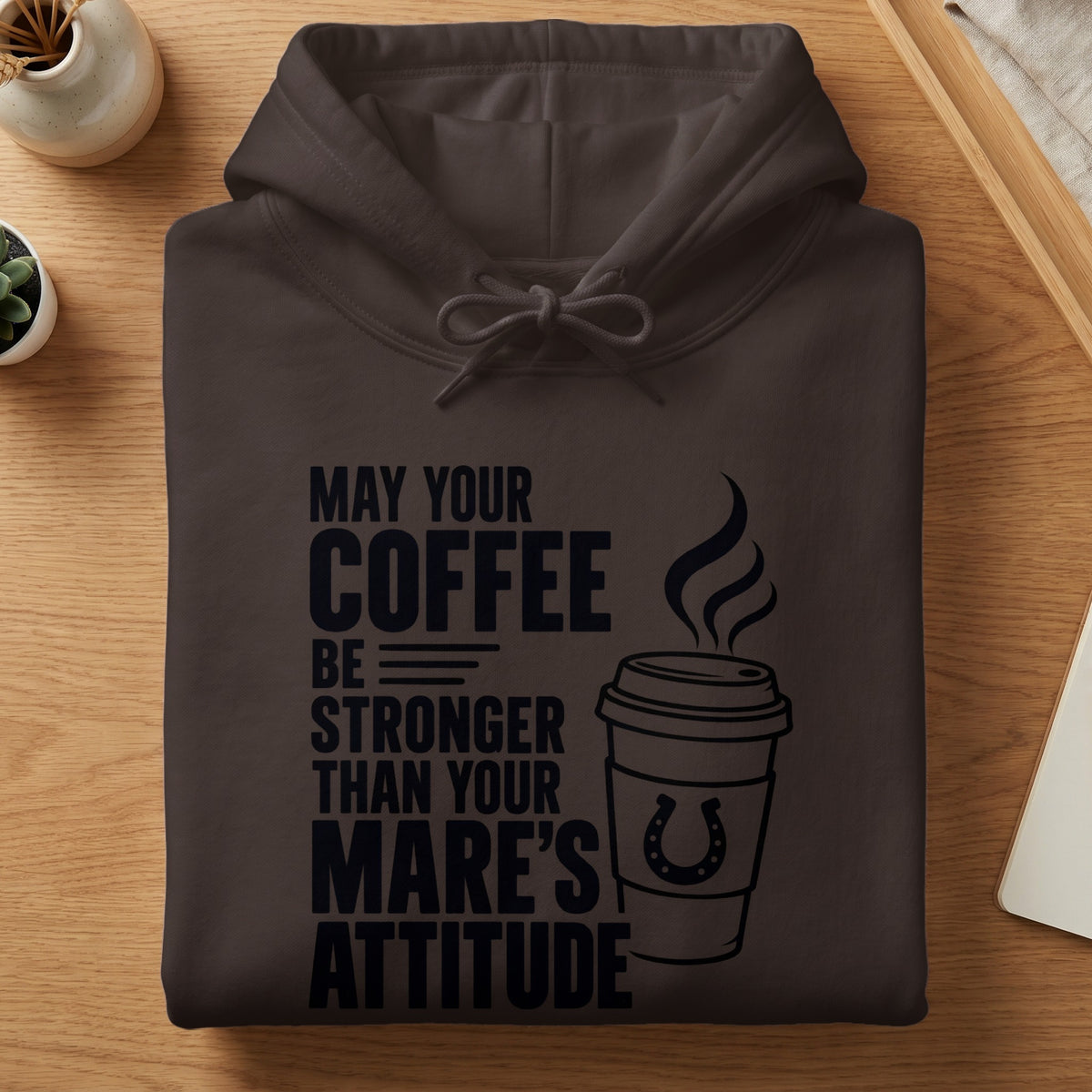 Brown hoodie with "May your coffee be stronger than your mare's attitude" text.