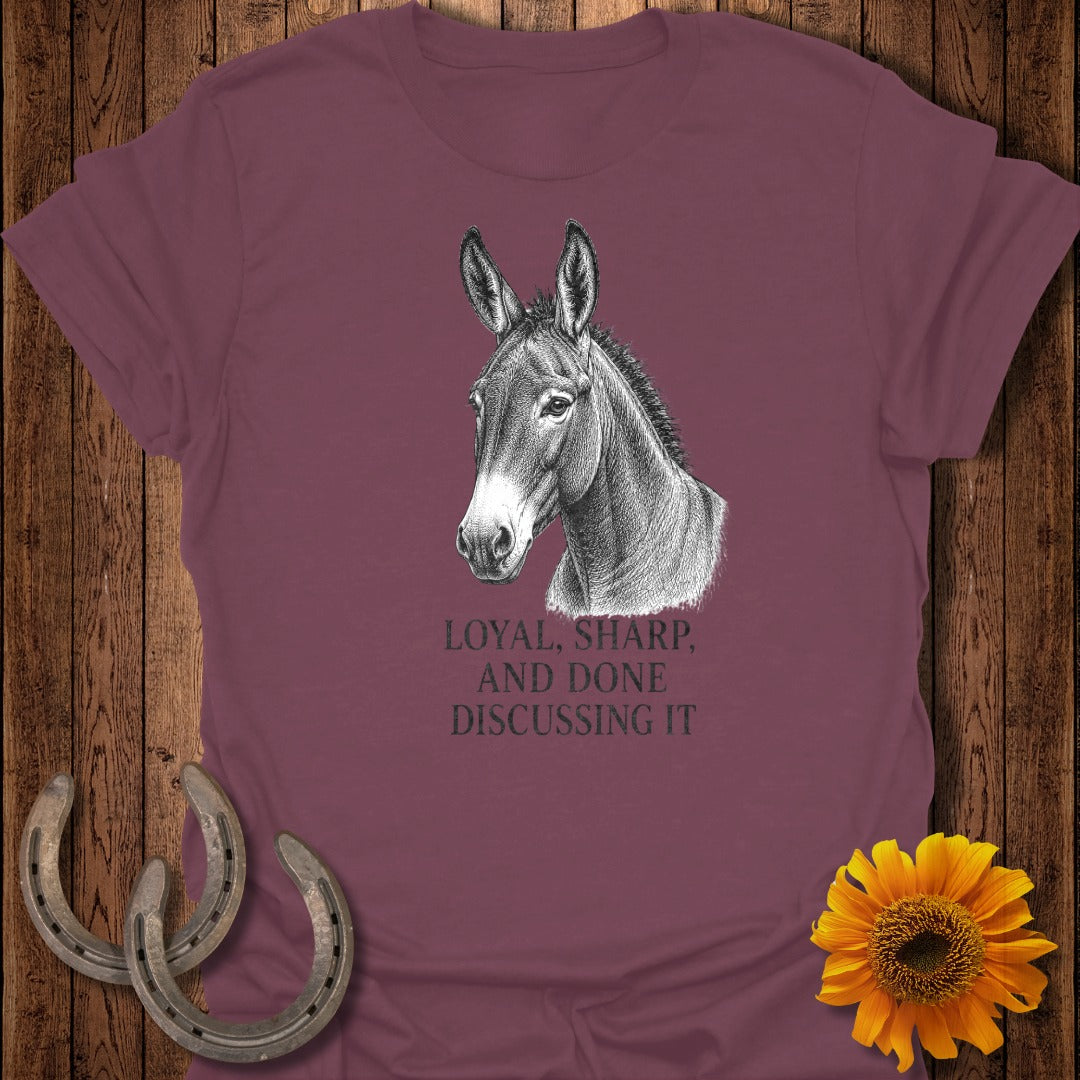 Maroon t-shirt with a donkey head and text "Loyal, sharp, and done discussing it."