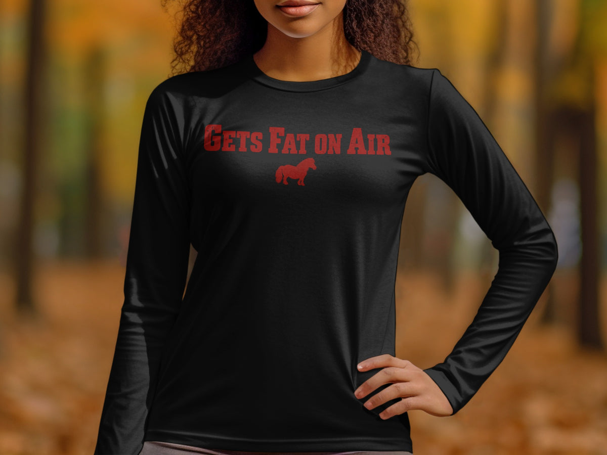 Black long sleeve shirt with red text "GETS FAT ON AIR" and a horse silhouette.
