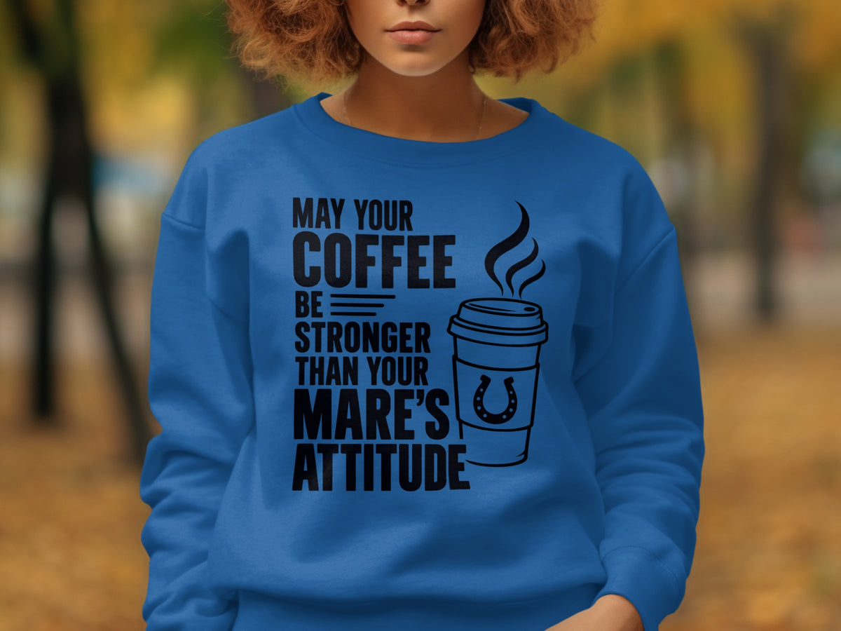 Blue sweatshirt with black text and horse shoe coffee cup graphic.