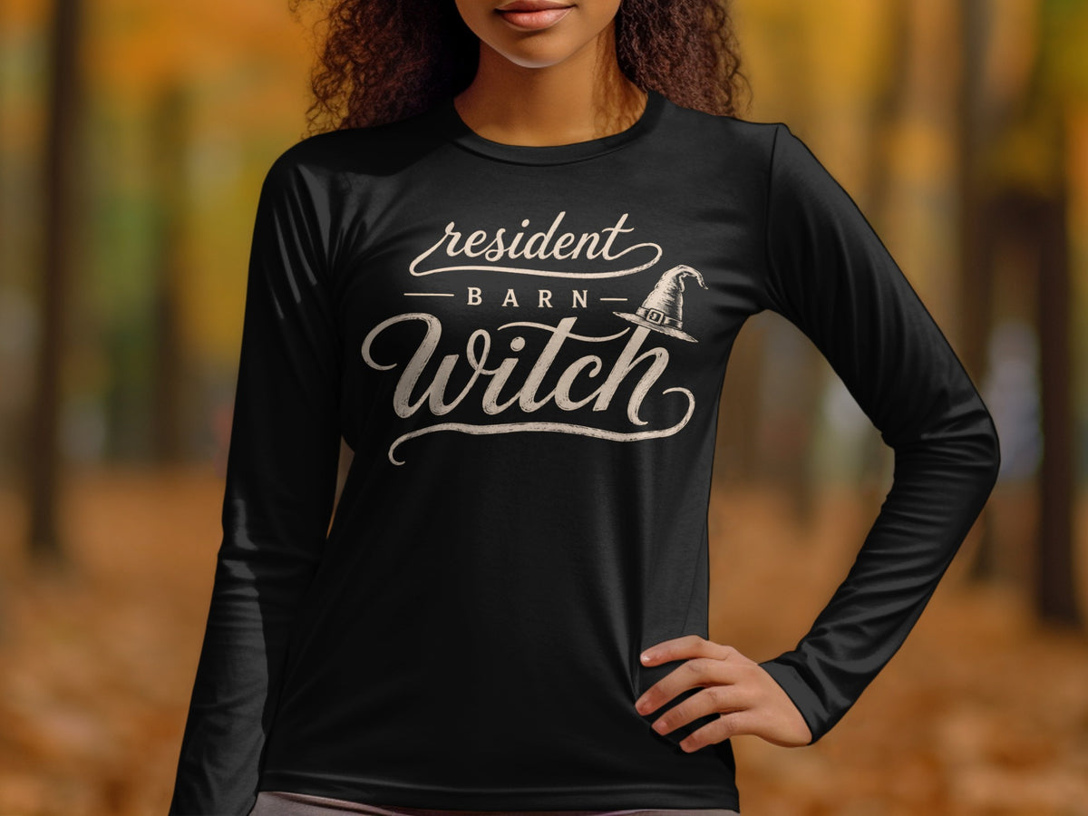 Black long-sleeve shirt with "resident BARN Witch" and witch hat graphic.