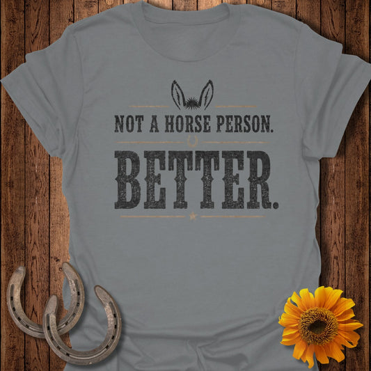 Grey t-shirt with text "NOT A HORSE PERSON. BETTER." and donkey ears graphic.