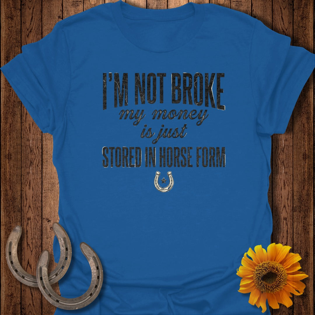 Blue t-shirt with "I'm not broke my money is just stored in horse form" text.