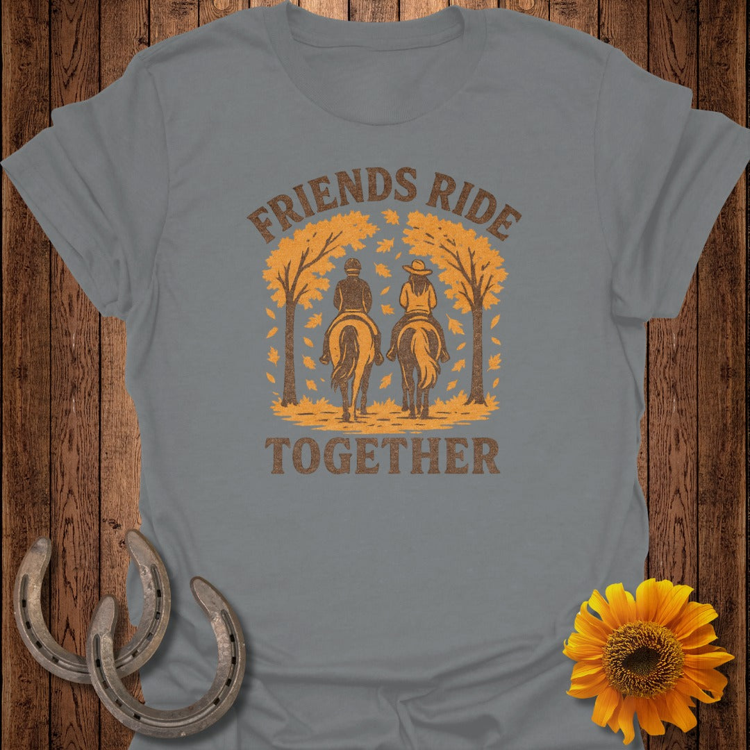 Grey t-shirt with two people riding horses under autumn trees, text "Friends Ride Together".
