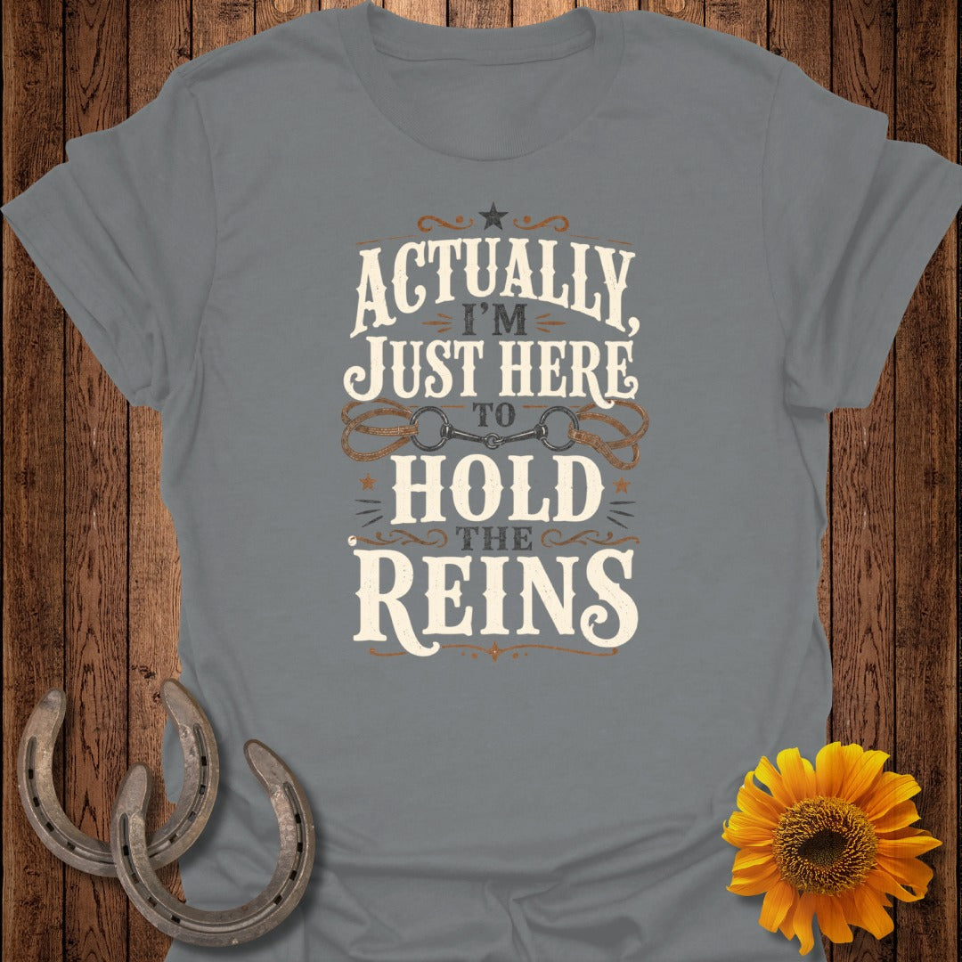 Grey t-shirt with "Actually I'm Just Here To Hold The Reins" graphic and horse bit.