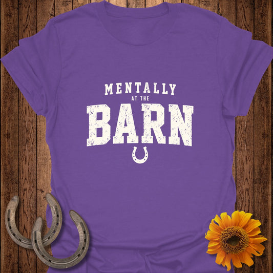 Purple t-shirt with "Mentally At The Barn" graphic and horseshoe design.
