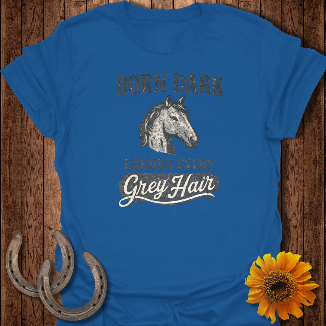 Blue t-shirt with horse graphic and text "Born Dark, Earned Every Grey Hair".
