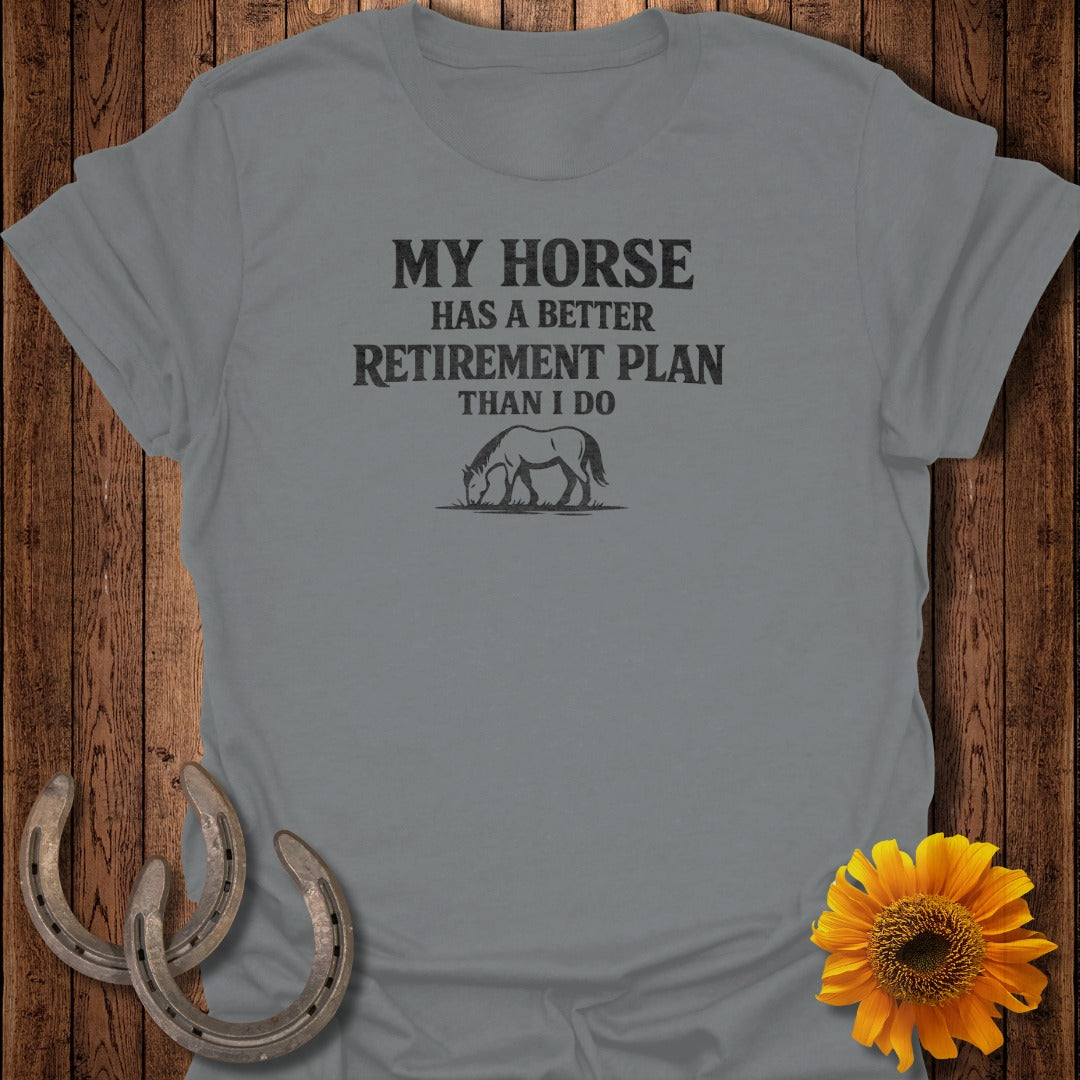 Grey t-shirt with text "My Horse Has A Better Retirement Plan Than I Do" and horse graphic.
