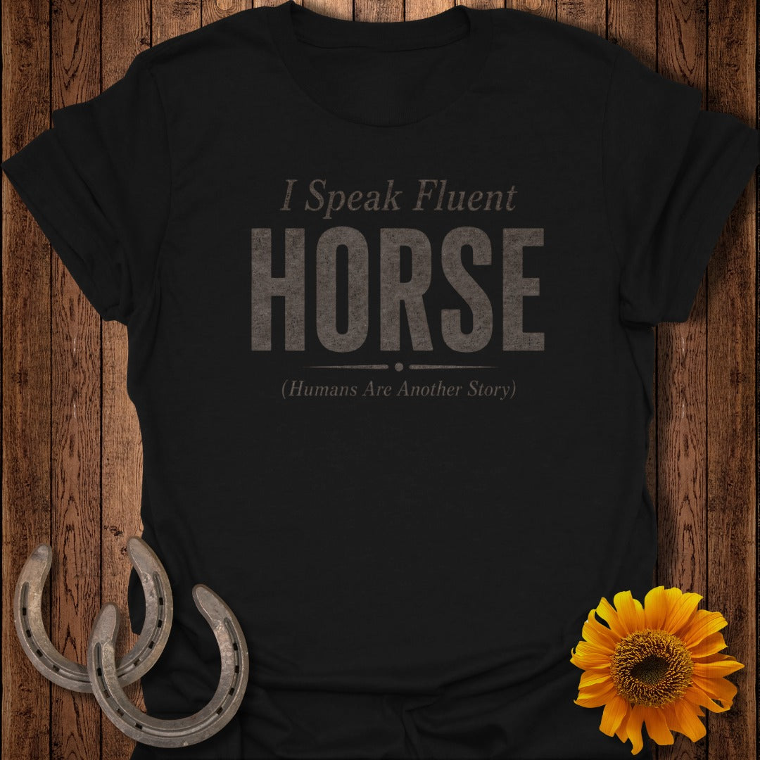 Black t-shirt with "I Speak Fluent HORSE (Humans Are Another Story)" text.