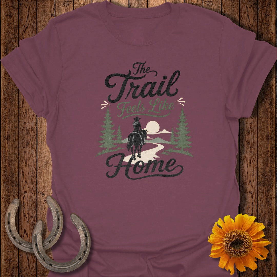 Maroon t-shirt with "The Trail Feels Like Home" text and a horse on a path.
