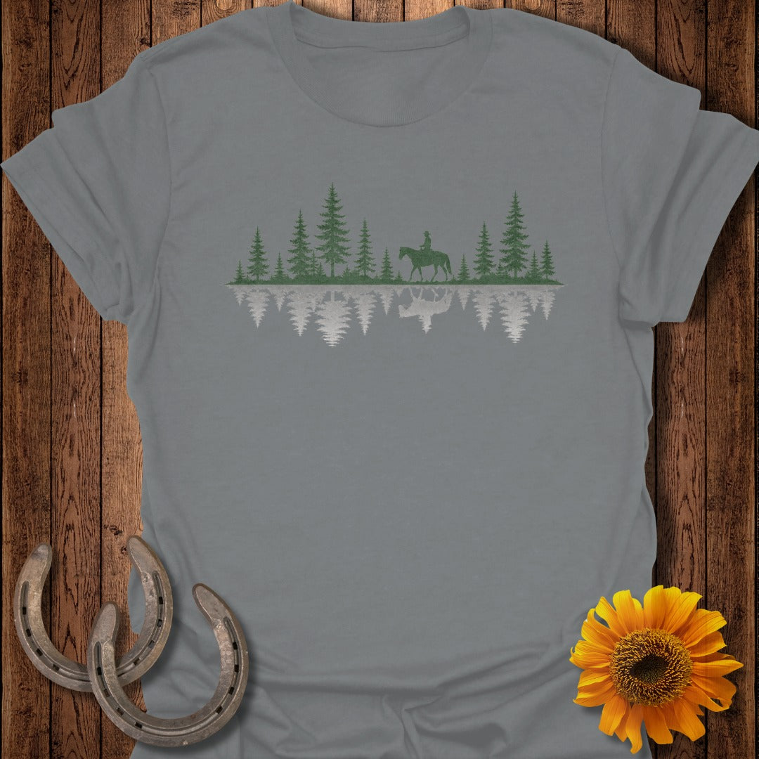 Grey t-shirt with a silhouette of a rider on horseback in a forest with a reflected image.