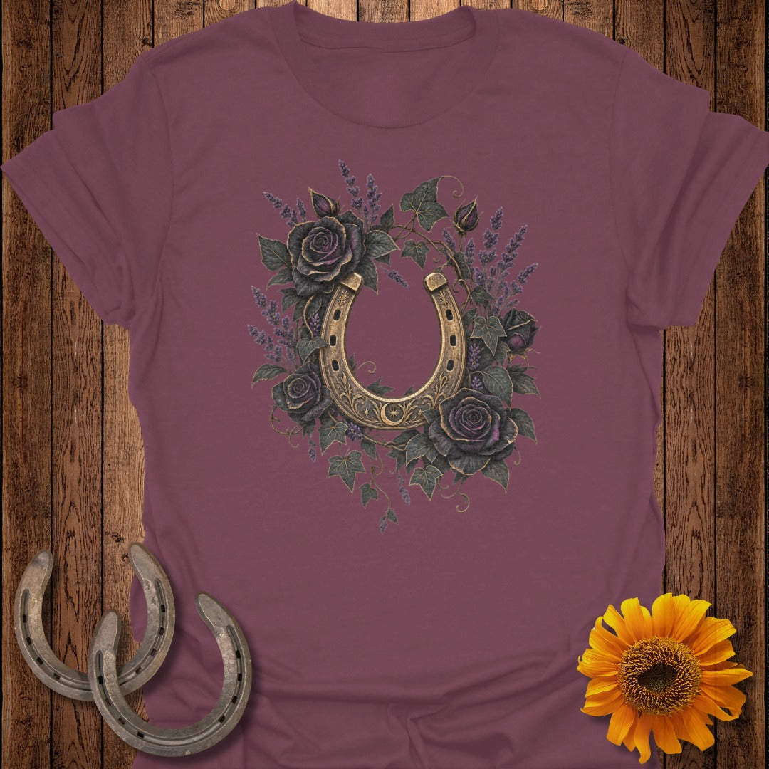 Maroon t-shirt with gold horseshoe, dark roses, and lavender floral design.
