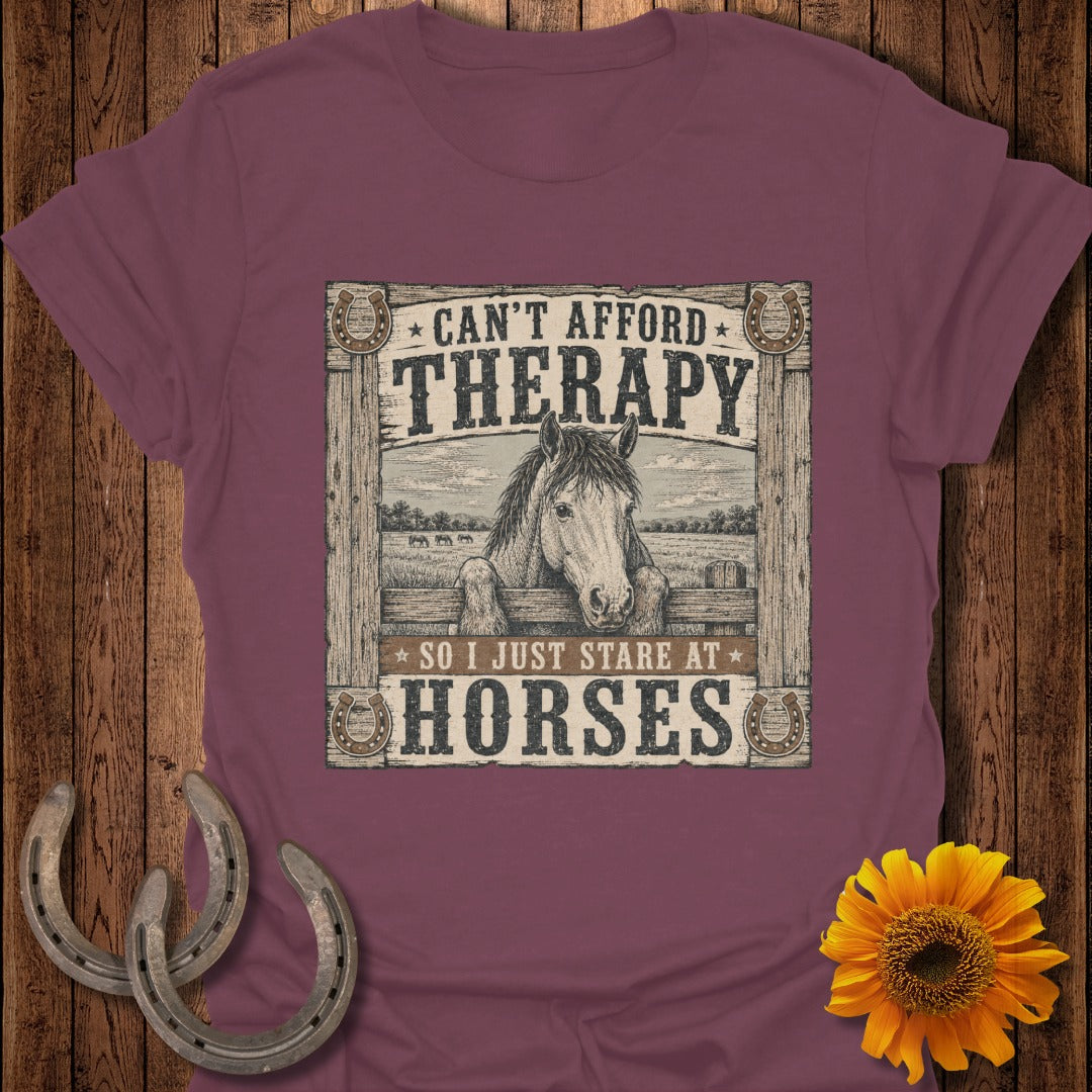 Maroon t-shirt with a distressed graphic of a horse's head and the text "Can't afford therapy so I just stare at horses".