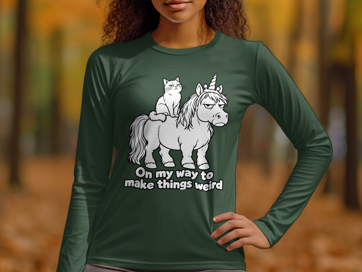 Green long-sleeve shirt with a cat riding a unicorn with the text "On my way to make things weird".
