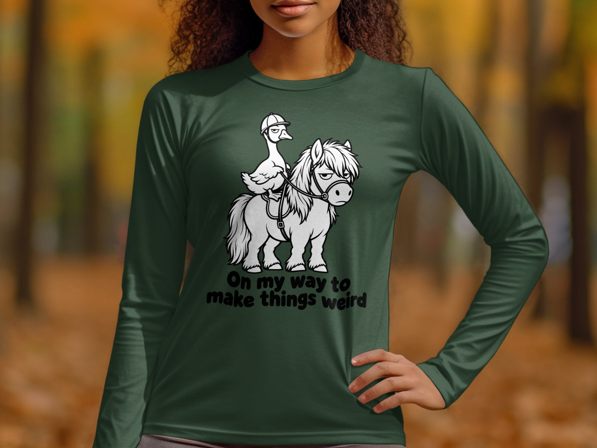 T-shirt graphic: duck in helmet riding pony with text "On my way to make things weird".