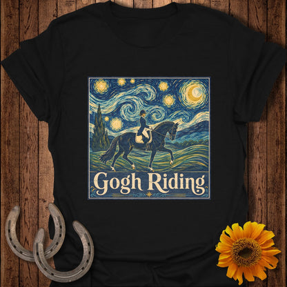 Black t-shirt with a print in Van Gogh's Starry Night style showing a rider on a horse with text "Gogh Riding".
