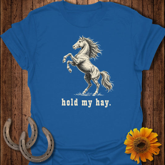 Blue t-shirt with rearing horse graphic and text "hold my hay."