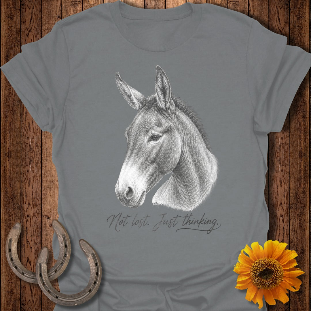 Grey t-shirt with a sketch of a mule head and text "Not lost. Just thinking."