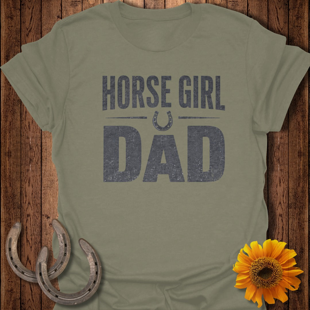 Olive green t-shirt with "HORSE GIRL DAD" text, horseshoe graphic, and horseshoes.