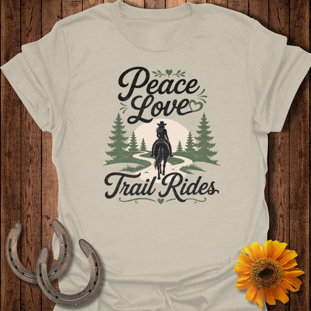 Light t-shirt with "Peace Love Trail Rides" graphic and horseback rider.