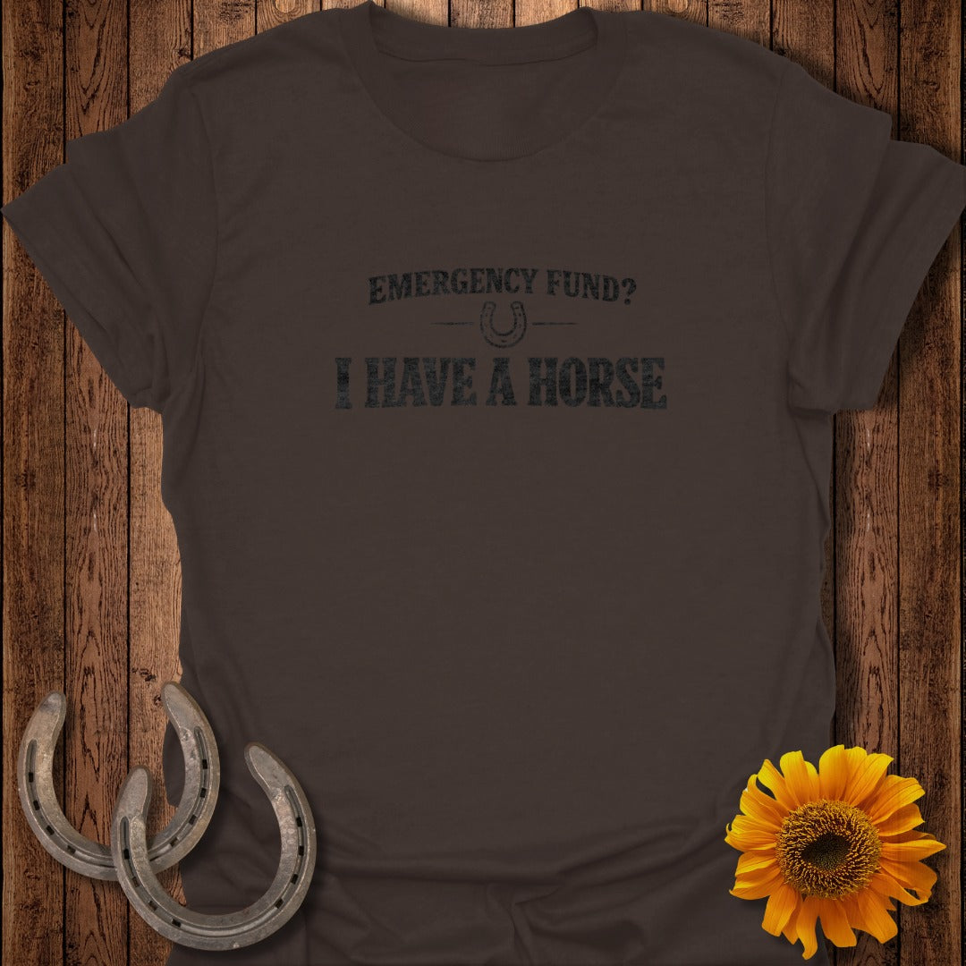 Brown t-shirt with "EMERGENCY FUND? I HAVE A HORSE" text and horseshoe graphic.
