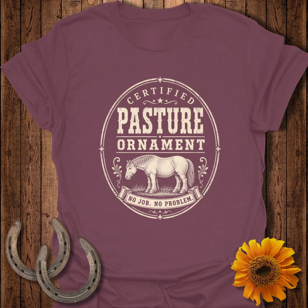 Maroon t-shirt with "Certified Pasture Ornament" and horse graphic.