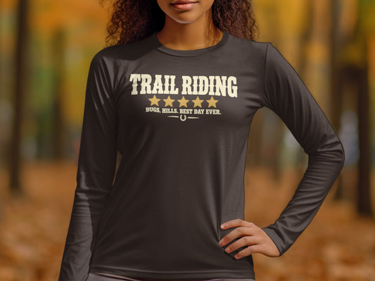 Dark long-sleeve shirt with "TRAIL RIDING" and horseshoe graphic.