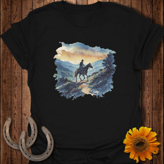 Black t-shirt featuring a Western landscape with a lone rider on horseback.