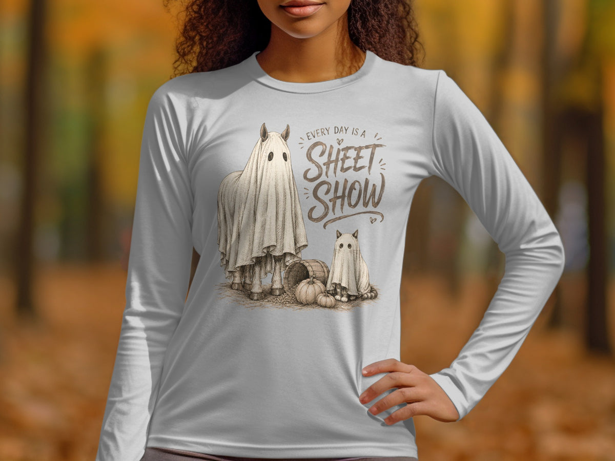 Horse and cat dressed as ghosts with pumpkins and text "Every day is a sheet show."