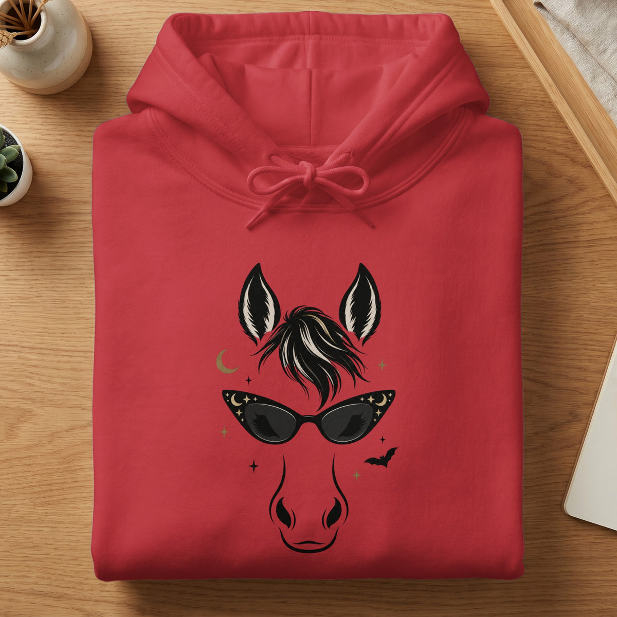 Red hoodie with a black horse face graphic wearing cat-eye sunglasses and stars.