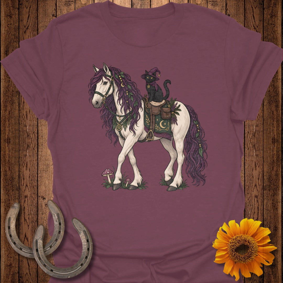 Black cat in witch hat riding white horse with purple mane and decorative saddle.