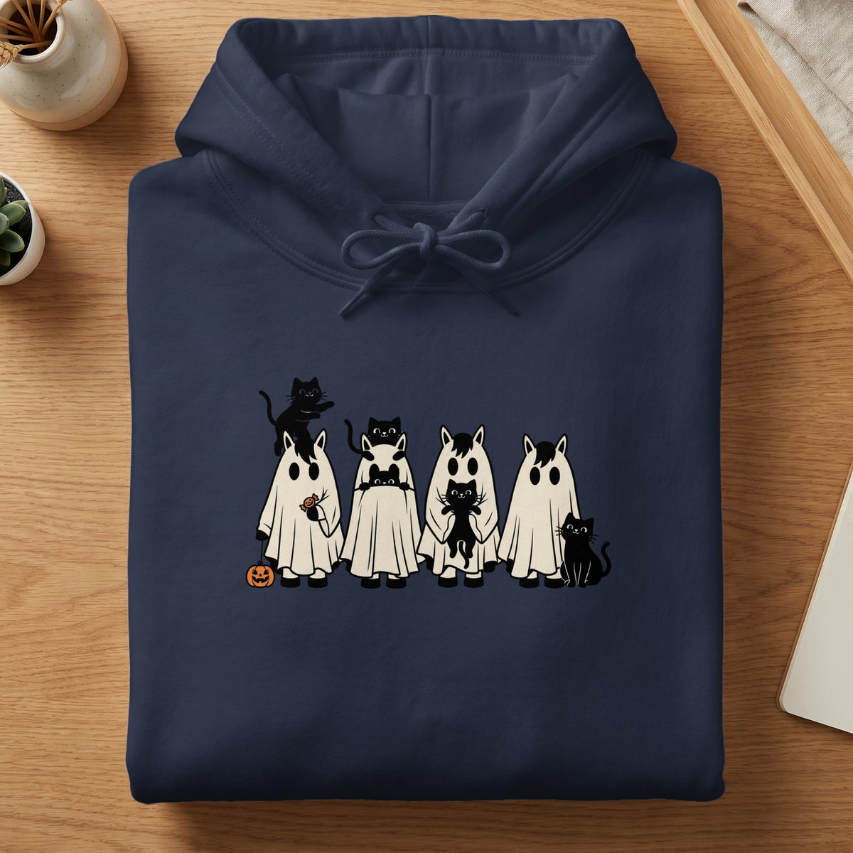 Navy hoodie with Halloween ghost and cat graphic print.