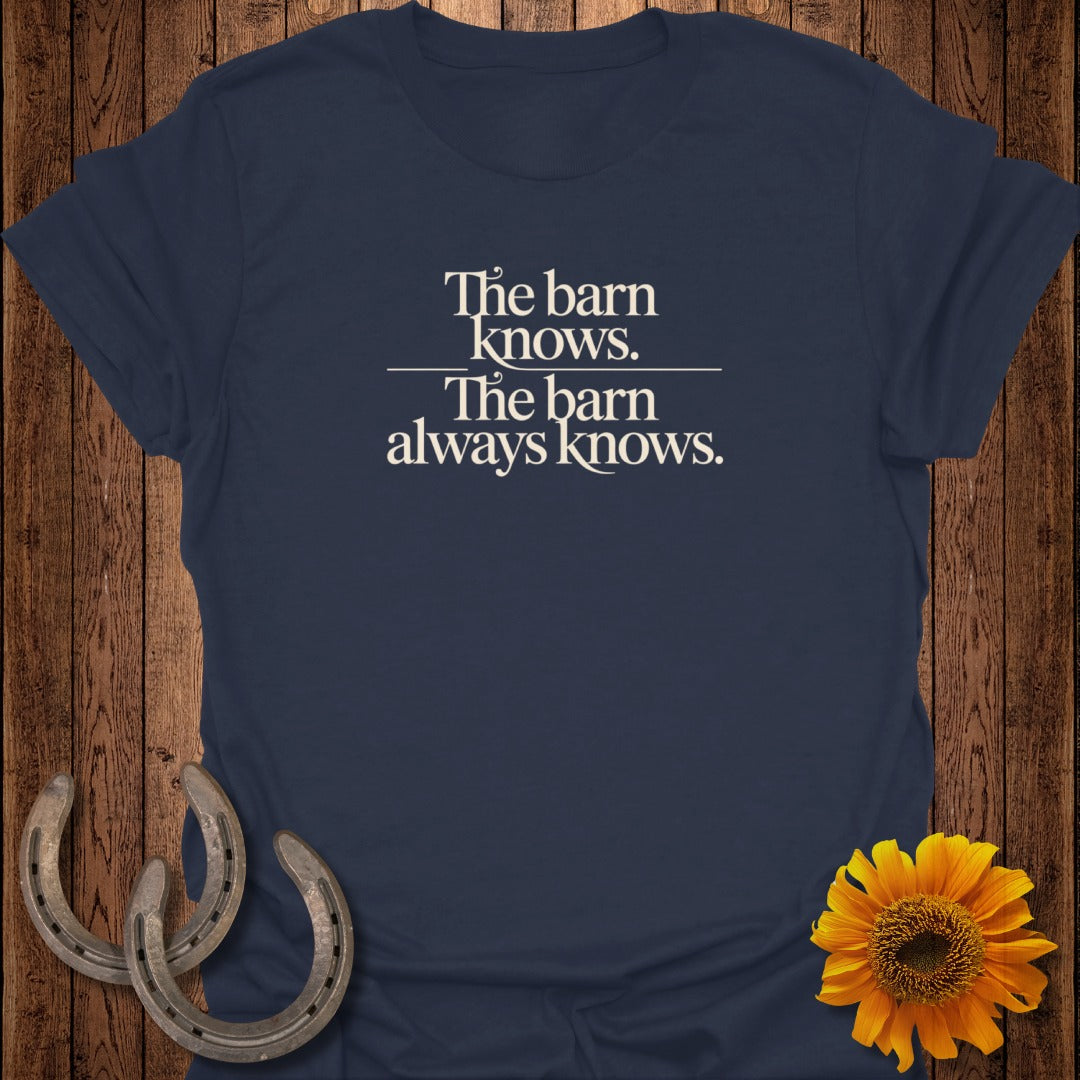 Navy t-shirt with "The barn knows. The barn always knows." text.