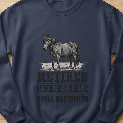 Navy sweatshirt with sketch of a horse and text "RETIRED UNRIDEABLE STILL EXPENSIVE"