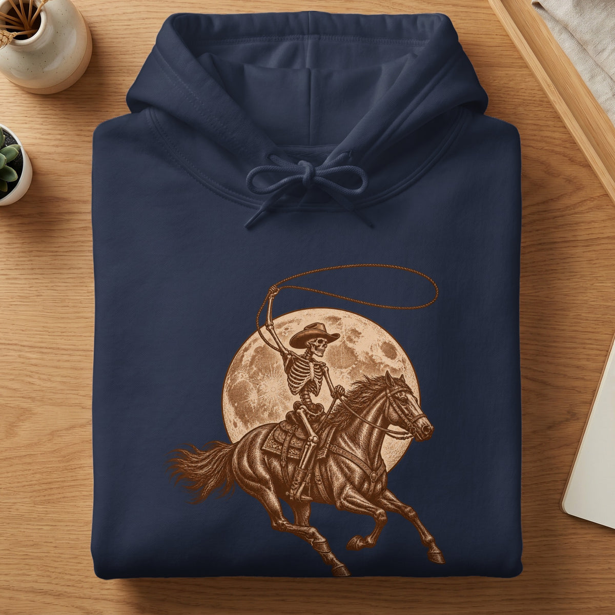 Skeleton cowboy riding a horse with lasso against a moon.