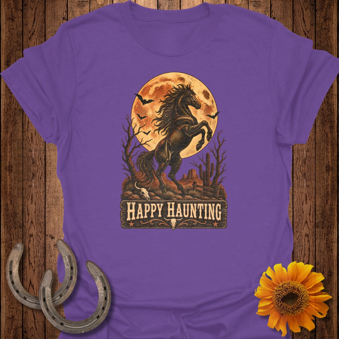 Purple t-shirt with a rearing horse under a full moon, bats, and the text "Happy Haunting".