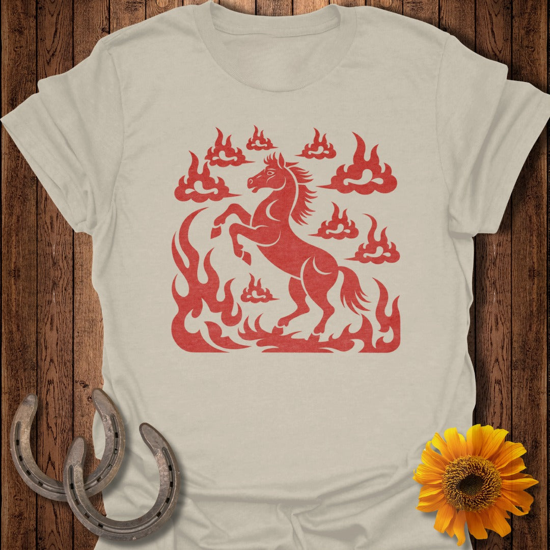 Red horse design with flames and clouds on a cream t-shirt.